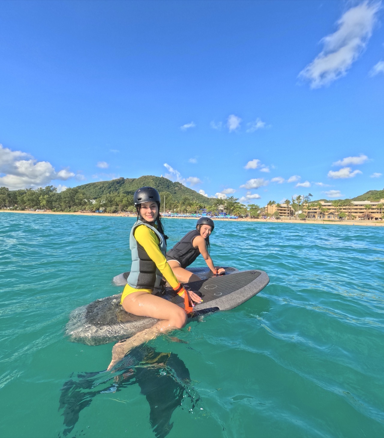 E-foil lesson Koh Samui — stand-up hydrofoil riding with instructor coaching